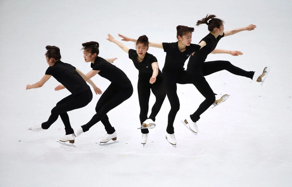 silver-medalist-yuna-kim-works-through-a-jump-in-practice